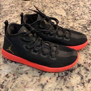 Black Nike Jordan’s with red soles size 4.5Y